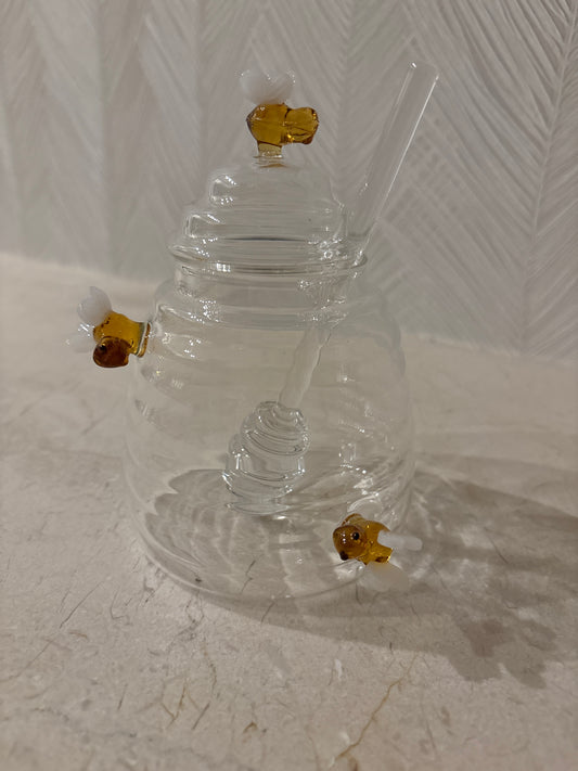 Honey jar with bees everywhere